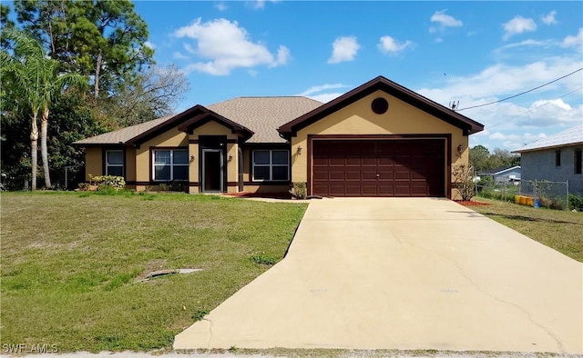 single story home with a front yard and a garage