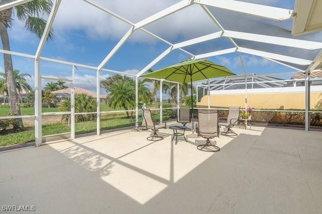 view of patio / terrace with a lanai