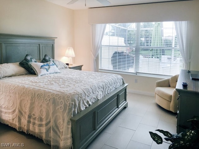 bedroom featuring baseboards