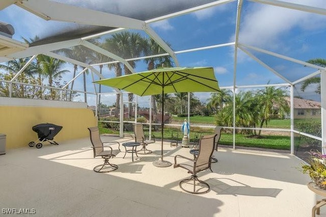 view of patio with a lanai