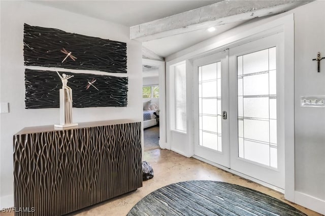 interior space featuring concrete floors and french doors