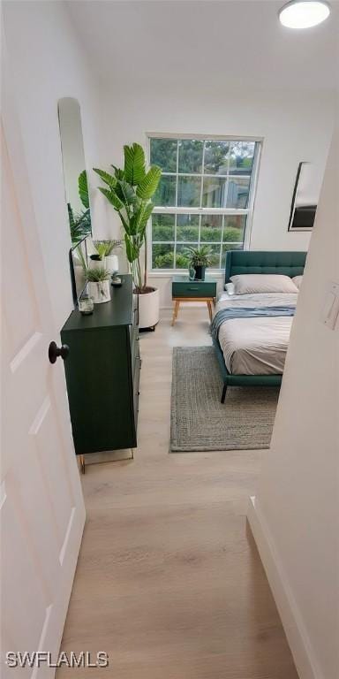 bedroom featuring light hardwood / wood-style flooring