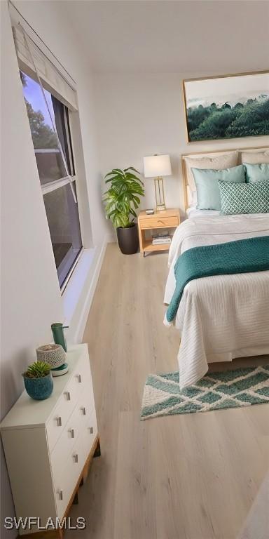 bedroom featuring light hardwood / wood-style flooring