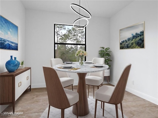 dining area with a chandelier