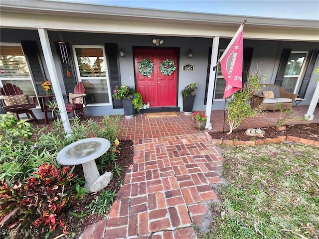 entrance to property with covered porch