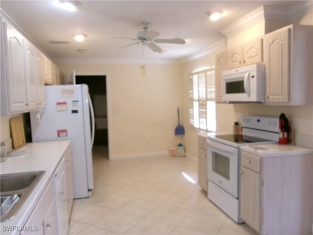 5447 Capbern Ct, Fort Myers, FL 33919 - kitchen featuring ornamental molding, light countertops, white appliances, and white cabinetry