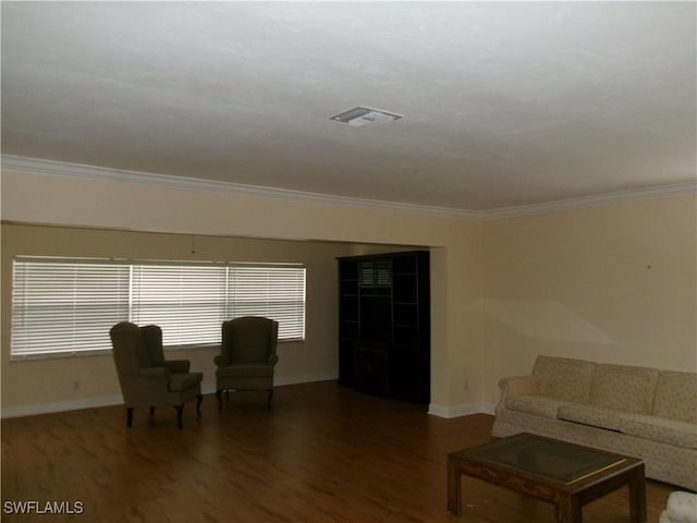 5447 Capbern Ct, Fort Myers, FL 33919 - living room featuring ornamental molding, wood finished floors, visible vents, and baseboards