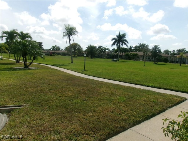 5447 Capbern Ct, Fort Myers, FL 33919 - surrounding community with a yard