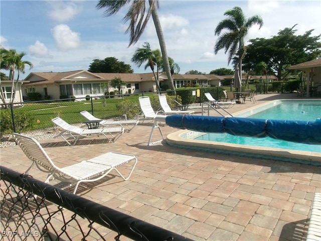 5447 Capbern Ct, Fort Myers, FL 33919 - pool with a patio area and fence
