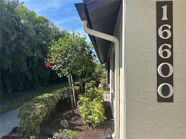 exterior details featuring stucco siding