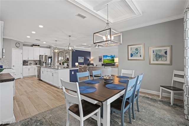 dining room featuring a notable chandelier, recessed lighting, visible vents, ornamental molding, and light wood finished floors