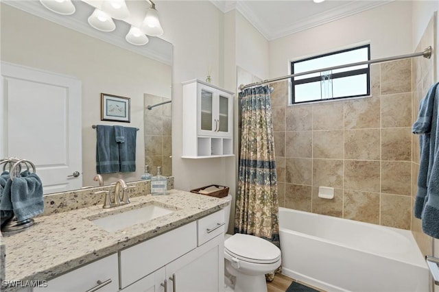 full bath with crown molding, toilet, an inviting chandelier, shower / bath combo, and vanity