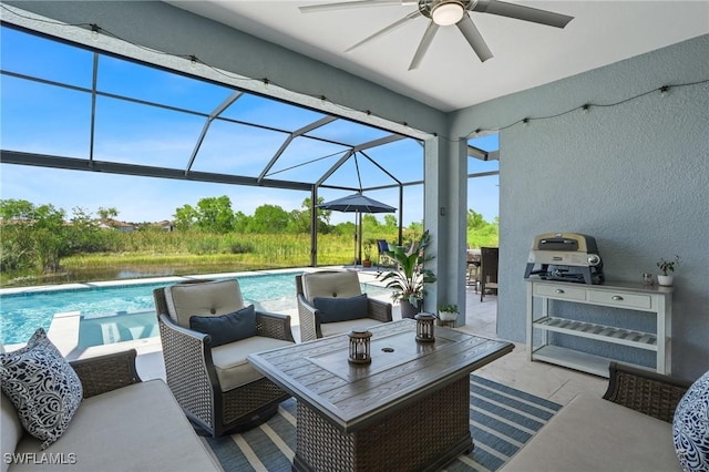 view of patio / terrace with ceiling fan, glass enclosure, a grill, an outdoor living space, and an outdoor pool