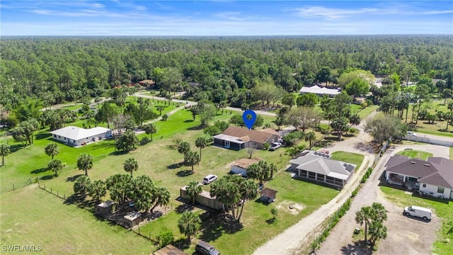 bird's eye view featuring a view of trees