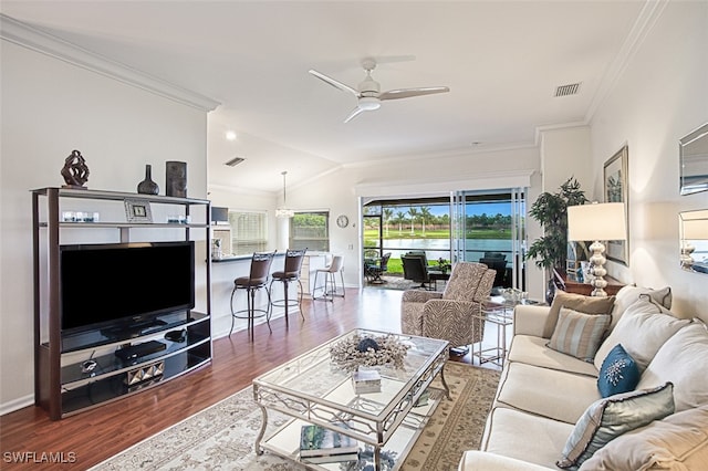 living area featuring crown molding, a ceiling fan, wood finished floors, and visible vents