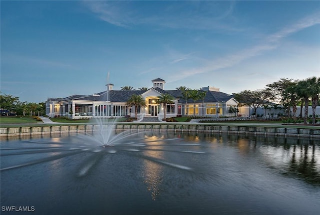 exterior space with a water view