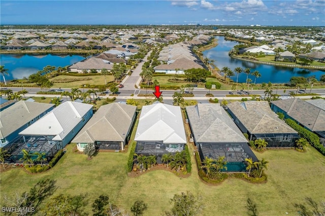 drone / aerial view featuring a water view