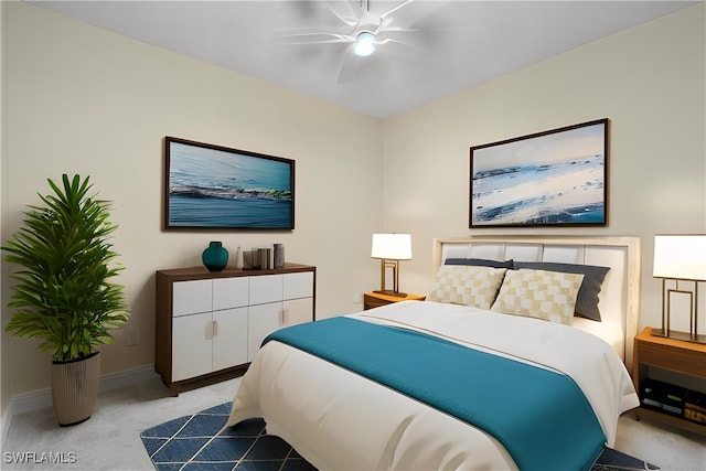 carpeted bedroom with ceiling fan