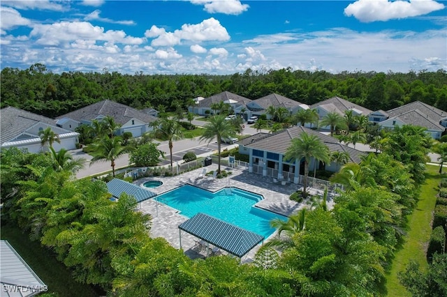 view of swimming pool featuring a patio area