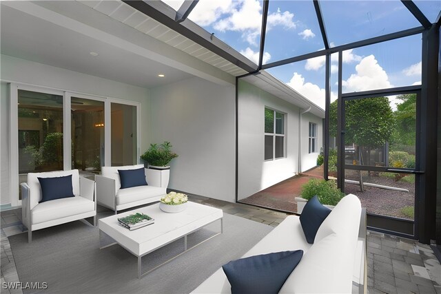 sunroom / solarium with beamed ceiling