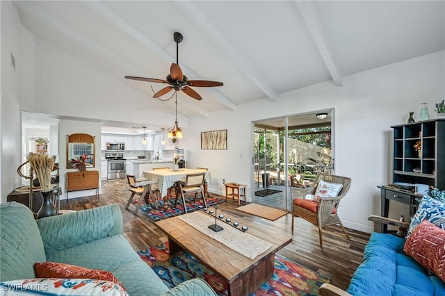 living area with ceiling fan, beam ceiling, high vaulted ceiling, and wood finished floors