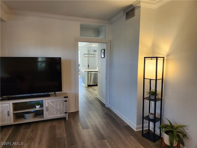 living room featuring ornamental molding, dark wood-type flooring, and baseboards