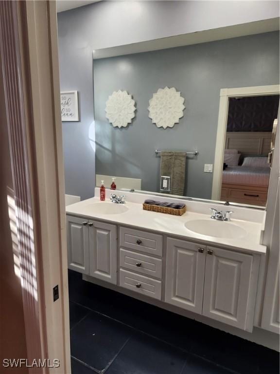 bathroom featuring tile patterned floors and double vanity