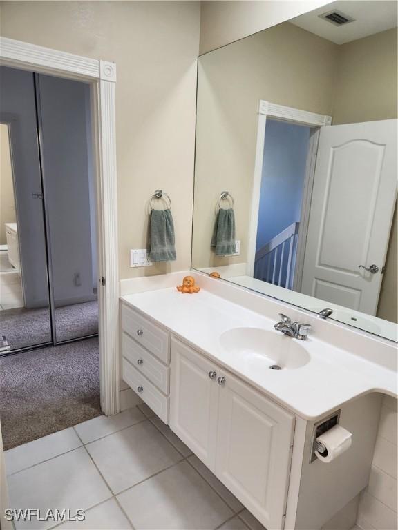 bathroom featuring vanity and tile patterned floors