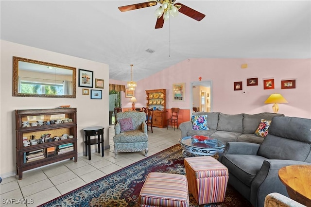 living area with lofted ceiling, light tile patterned floors, a ceiling fan, and visible vents