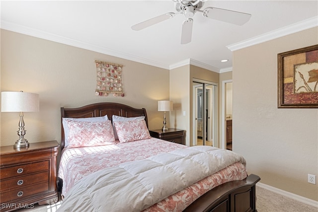 carpeted bedroom featuring ceiling fan, ornamental molding, and a closet