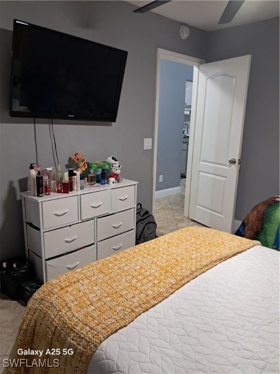 bedroom featuring light tile patterned floors