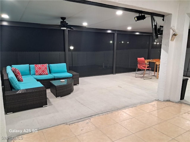 view of patio / terrace with ceiling fan, an outdoor hangout area, and outdoor dining area