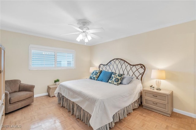 bedroom with ceiling fan, baseboards, and ornamental molding