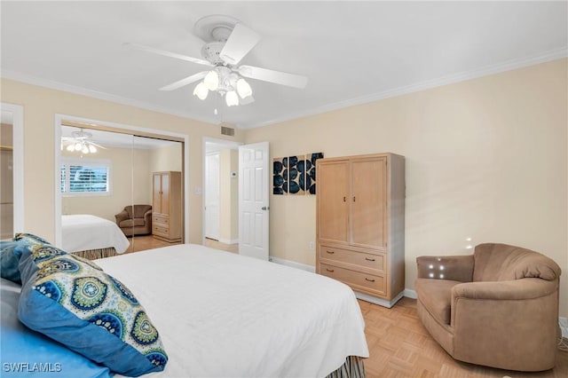 bedroom featuring a ceiling fan, baseboards, visible vents, a closet, and crown molding