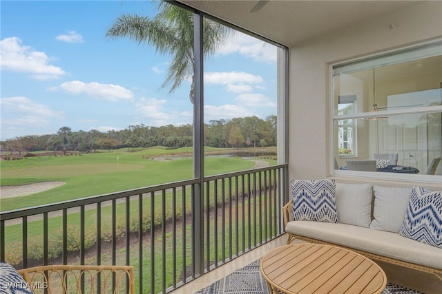 balcony featuring view of golf course