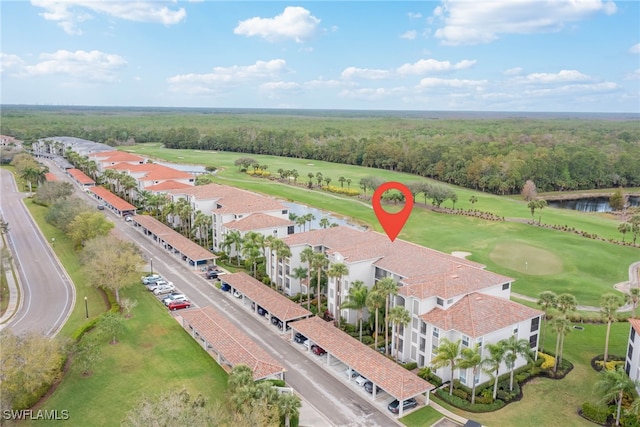 bird's eye view featuring a water view and a residential view