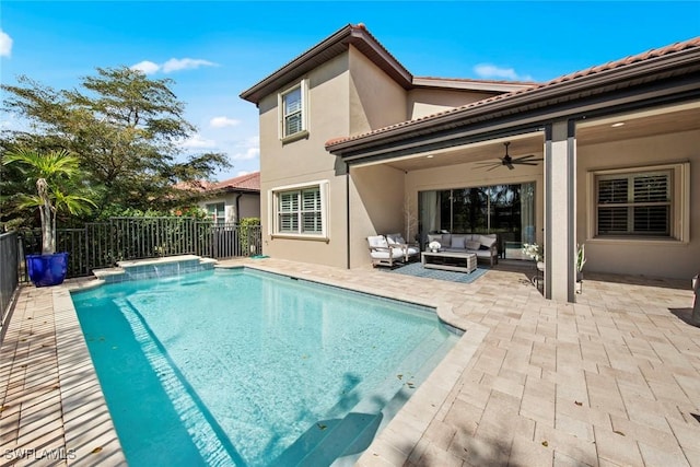 rear view of property featuring a patio area, ceiling fan, an outdoor hangout area, and a fenced backyard