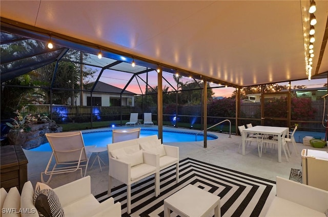 view of swimming pool with a fenced in pool, a patio, an outdoor hangout area, glass enclosure, and a fenced backyard