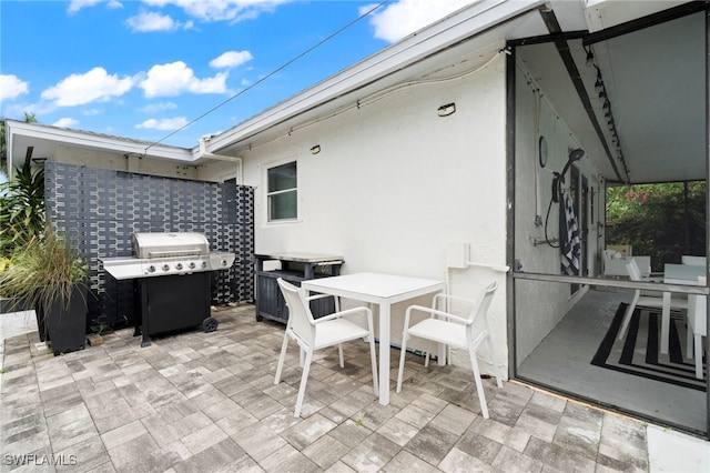 view of patio / terrace with outdoor dining space and area for grilling