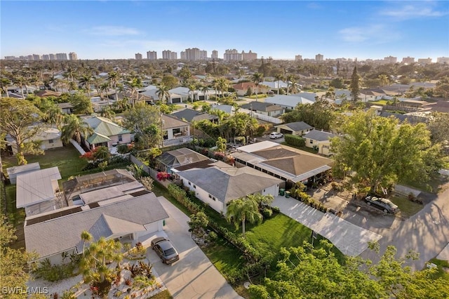 birds eye view of property featuring a city view