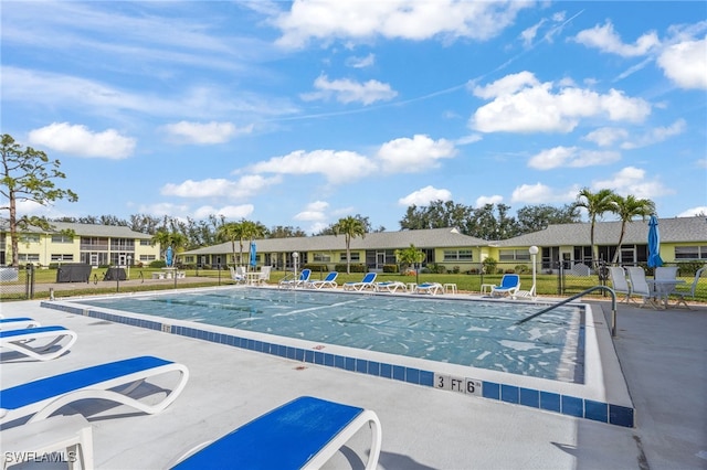 1050 Lake Mcgregor Dr Unit 6747, Fort Myers, FL 33919 - view of swimming pool with a patio area, a residential view, and fence