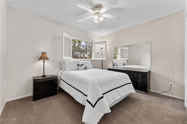 1050 Lake Mcgregor Dr Unit 6747, Fort Myers, FL 33919 - bedroom featuring a textured ceiling, ceiling fan, carpet flooring, and baseboards