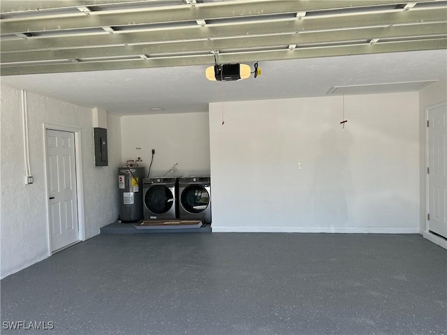 garage featuring electric panel, a garage door opener, washer and dryer, and water heater