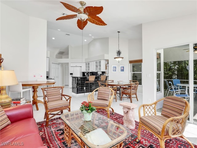 living room featuring visible vents, high vaulted ceiling, a ceiling fan, and recessed lighting