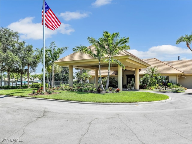 surrounding community featuring a lawn, a gazebo, and fence