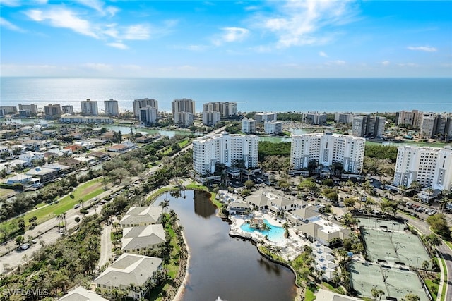 bird's eye view featuring a view of city and a water view