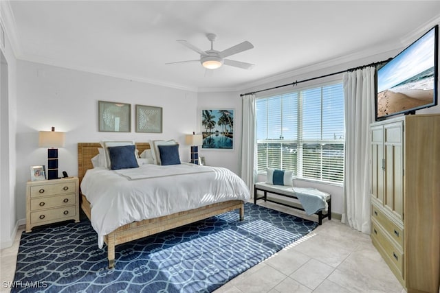 bedroom with baseboards, ornamental molding, a ceiling fan, and light tile patterned flooring