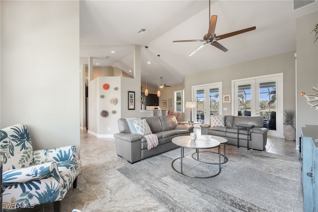 living area featuring ceiling fan, high vaulted ceiling, french doors, and visible vents