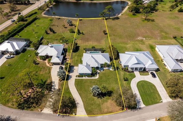 drone / aerial view featuring a water view