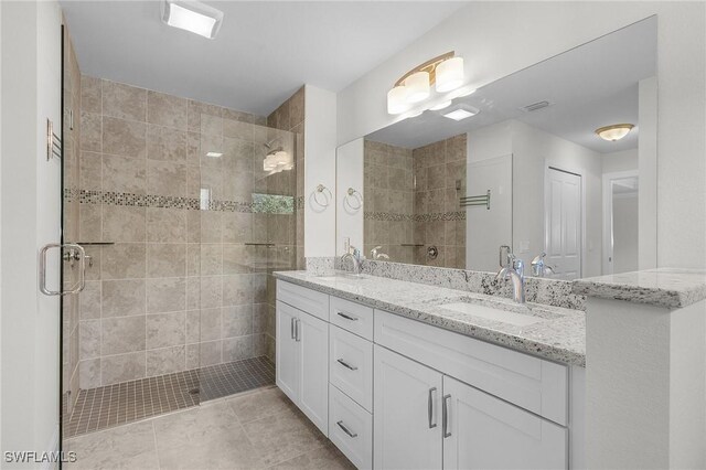 1729 SW 22nd Ter, Cape Coral, FL 33991 - bathroom with tile patterned floors, vanity, and walk in shower
